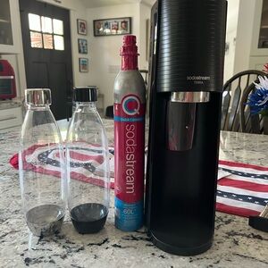 Like new used twice. Soda Stream with two bottles and gas.